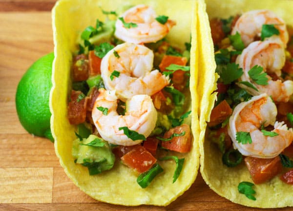 These Baja Shrimp Tacos with Fiesta Avocado Salsa are so delicious, perfect for Taco Tuesday! | Tastefulventure.com