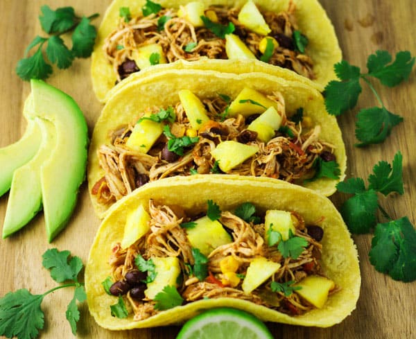 These Slow Cooker Hawaiian Chicken Tacos are a crowd favorite! | Tastefulventure.com