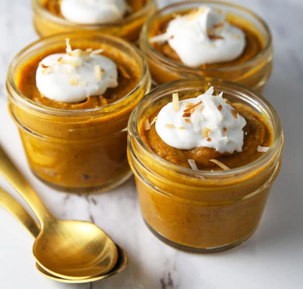 This Pumpkin Pie Coconut Pudding is so creamy, dreamy, and savory. It's sure to be your new favorite Fall dessert! #dairyfree #glutenfree #vegetarian #dessert #recipe #desserts #Thanksgiving