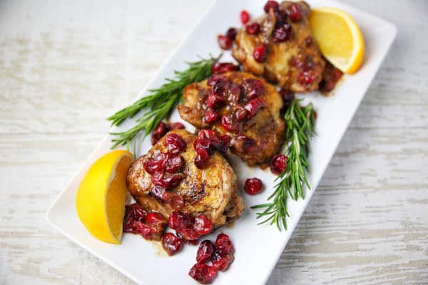 Cranberry Orange Chicken Thighs with Rosemary on a plate